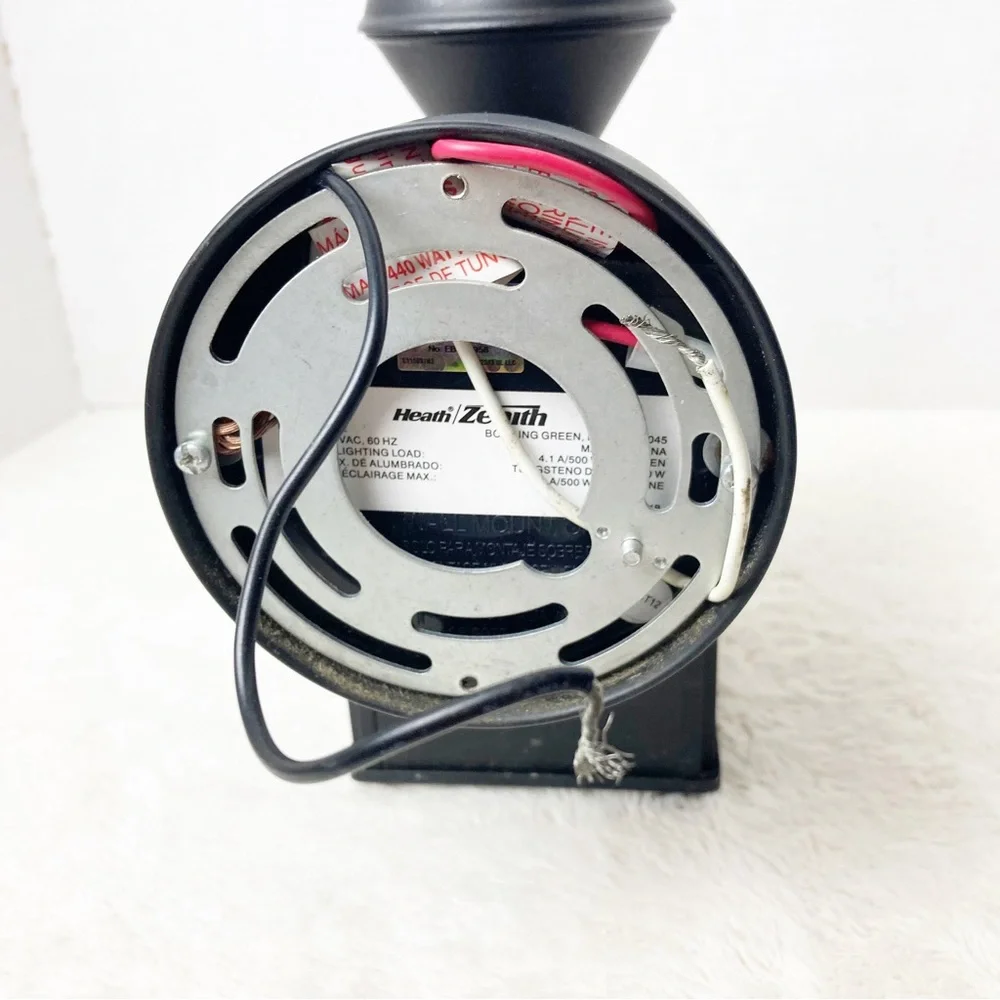 Black outdoor motion light sconce